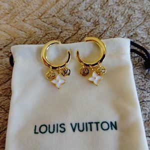 Vintage Louis Vuitton Stud Earrings with baggie.